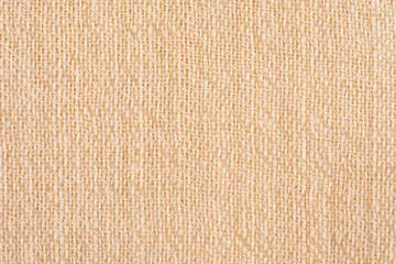 Beige fabric close-up. Background for designers.