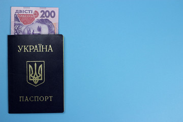 Ukrainian money hryvna, banknotes 200 UAH and passport