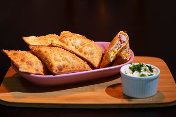 Ham and mozzarella pastry with tomato