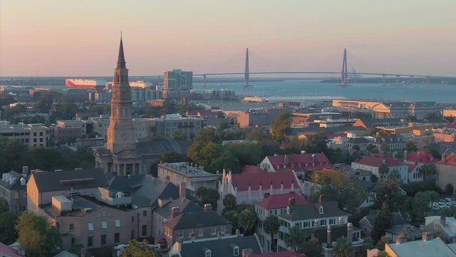 Aerial: St. Philip's Church and city skyline. Charleston, South Carolina, USA. 