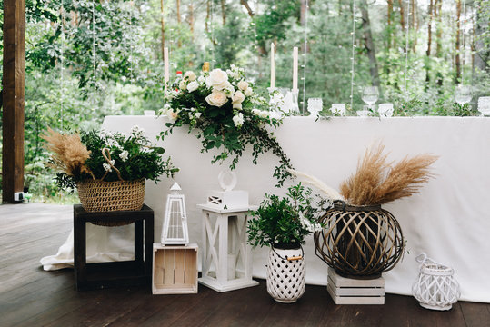 Various decor items at a wedding venue decorated for a stylish boho wedding 