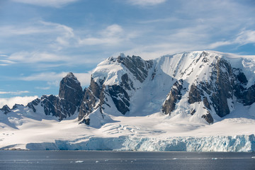 Mountain peaks with snow in Antarctica © Alexey Seafarer