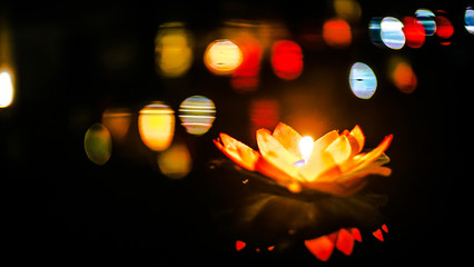 Lotus candle on river