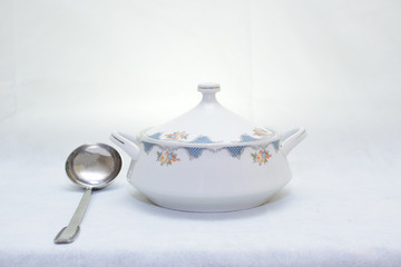 Mock up / design set of elegant and traditional teapot colorful white and blue coffee cup & Tea cup on cup's plate beside the hot tea pot , design/ drink-ware isolated on white background