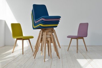 Colorful modern chairs in apartment