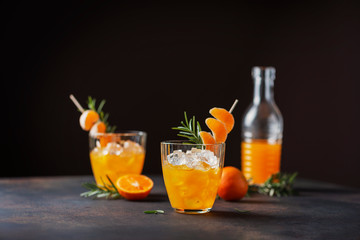 Alcoholic cocktail with mandarins