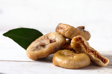 a bunch of sweet dried figs on the table