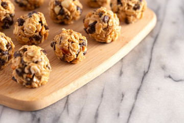 Peanut Butter and Oatmeal Energy Balls with Chocolate Chips Sweetened with Honey