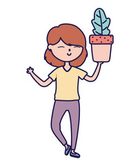 smiling young woman holding plant in pot