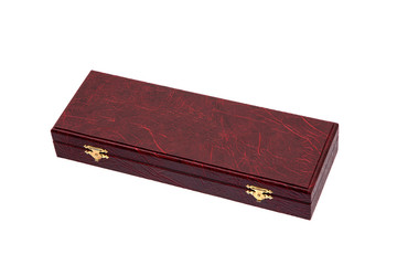 Red case with gilded locks. Box for an expensive gift. Luxury packaging isolate on a white background.