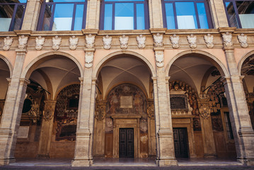 Fototapeta na wymiar View from inner court on Archiginnasi - historic main building of University in Bologna city, Italy