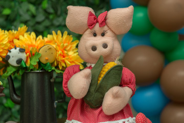 Birthday decoration, farm theme. Plush in the redneck theme.