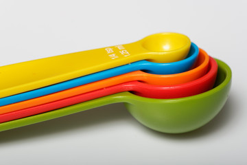 Colorful measurement spoons on the table