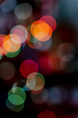 Light Red and orange holiday bokeh. Abstract Christmas background