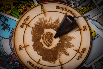 Pendulum reading and tarot cards