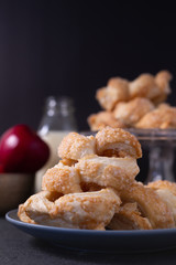 Apples danish pastries on a dark background