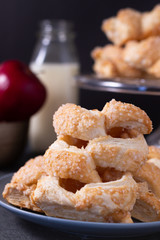 Apples danish pastries on a dark background
