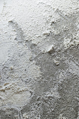 Moisture can cause peeling paint wall such as rainwater leaks or water leaks. Empty copy space for text. 