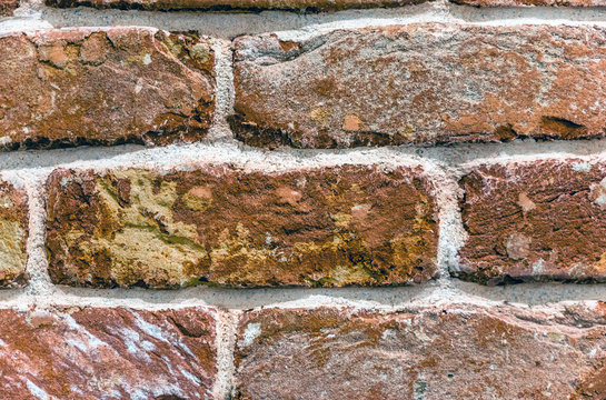 Brickwork from red clay-baked brick