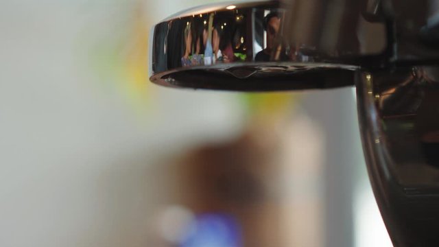 El Nido, Philippines - Cleaning Of Coffee Filter With Hot Water From The Coffee Making Machine - Closeup Shot