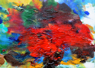 Impression on fresh paint of different colors. Abstraction spots and patterns. Background, close-up.