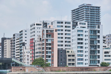 Residential High-Rise Cluster Under Clear Blue Sky in tokyo