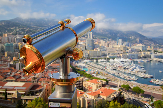 Telescope above Port Hercule in Monaco, Monte-Carlo on the French Riviera