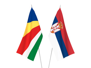 National fabric flags of Serbia and Seychelles isolated on white background. 3d rendering illustration.