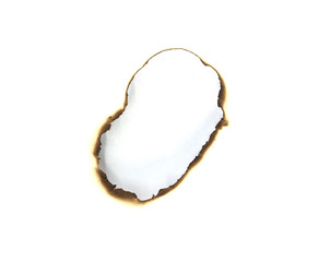 burnt hole in white paper background