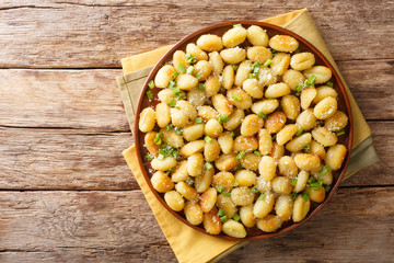 Gnocchi crisped in garlic and green onion infused butter with a generous amount of Parmesan cheese...