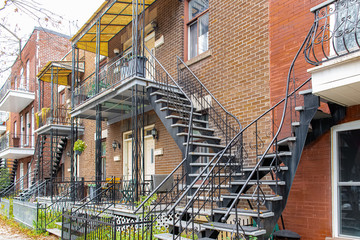 Montreal, typical victorian house with exterior staircase in the Plateau Mont-Royal district in...