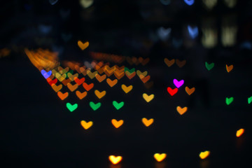 orange rainbow bokeh and blur heart shape love valentine day