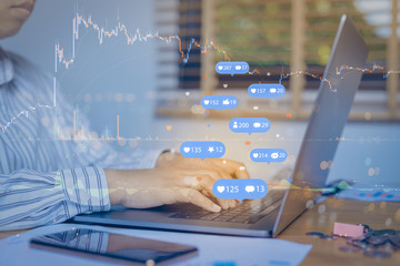 Double exposure of businessman using a social media marketing concept with notification icons with Investors are calculating on calculator investment costs, business finance concept.