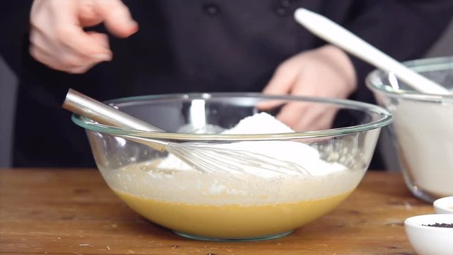 Time lapse. Step by step. Mixing organic ingredients in the glass bowl to bake challah.