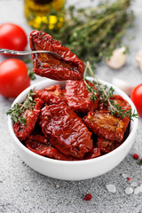 Sun dried tomatoes with fresh herbs and spices. 