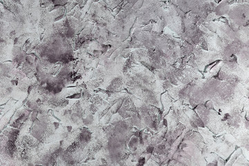 Textured light gray grunge background of concrete wall with rough surface 