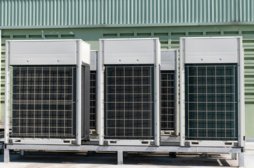 Compressors, air conditioners on the roof of the office building