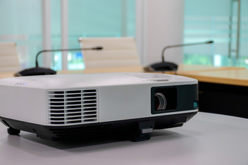 Close up White projector in the meeting room