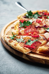 Supreme Pizza with paprika isolated on grey