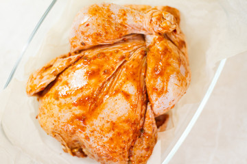 marinated chicken with seasonings. step-by-step recipe. baked meat in the oven. delicious and juicy white meat. dietary food.the view from the top. space for text.