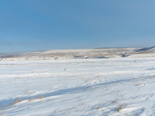 Fototapeta na wymiar view of the steppe on a clear Sunny winter day