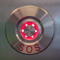 Modern SOS, help button made of stainless steel metal and illuminated glass indicator, details,...