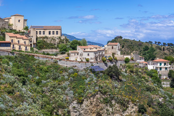Fototapeta na wymiar Houses on a hill in Savoca, small town on Sicily in Italy