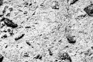Texture of a concrete wall with cracks and scratches which can be used as a background
