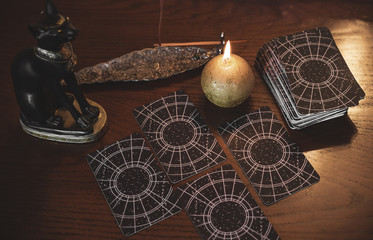 Mystical atmosphere, view of tarot card on the table, esoteric concept, fortune telling and predictions 