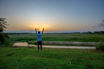 Natural panoramic nature background of rice fields, blown through the blurred cool air during the day, often seen in rural areas and scenic spots along the road.