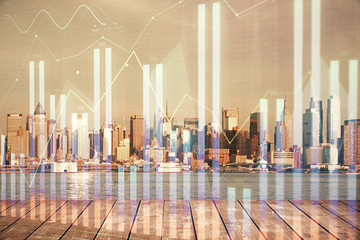 Forex graph on city view with skyscrapers background multi exposure. Financial analysis concept.