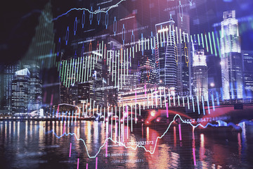 Obraz na płótnie Canvas Financial chart on city scape with tall buildings background multi exposure. Analysis concept.