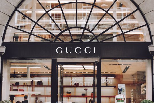 Gucci boutique. Signboard logo brend sign of Gucci on store, shop, mall, boutique. Kiev, Ukraine - September 02, 2019