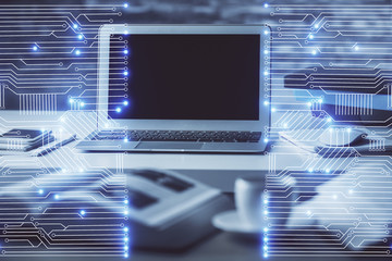 Computer on desktop in office with technology theme hologram. Multi exposure. Tech concept.